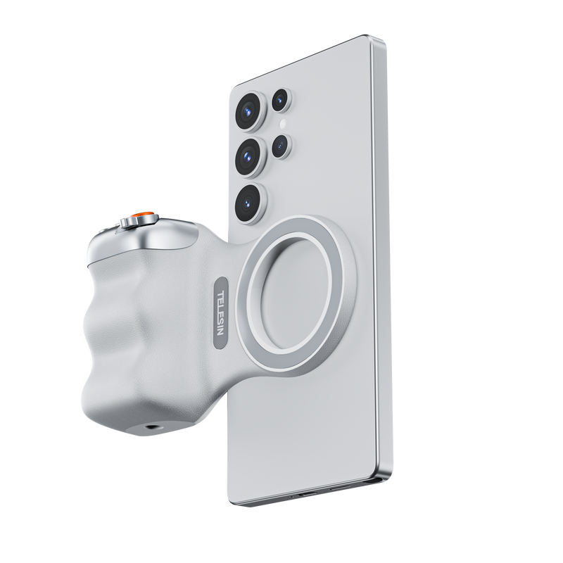 Magnetic mobile phone camera handle